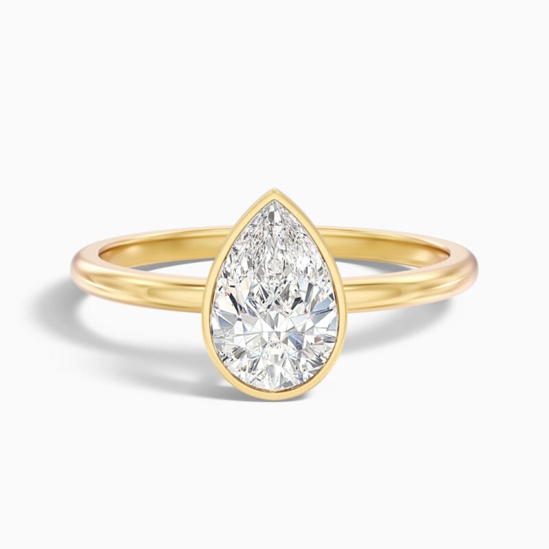 Nasya 2 Carat Pear Cut Bezel Set Moissanite Diamond Ring in 14k Yellow Gold